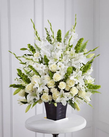 white sympathy basket with black vase